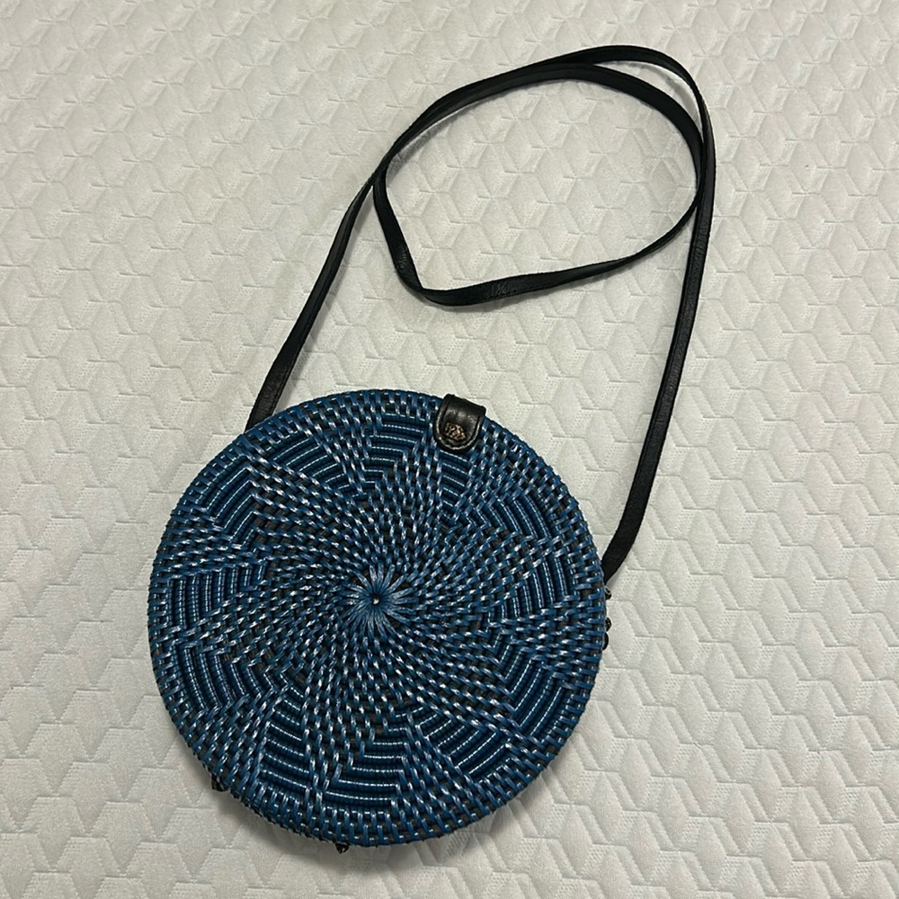 - Tan Woven Round Shoulder Bag.